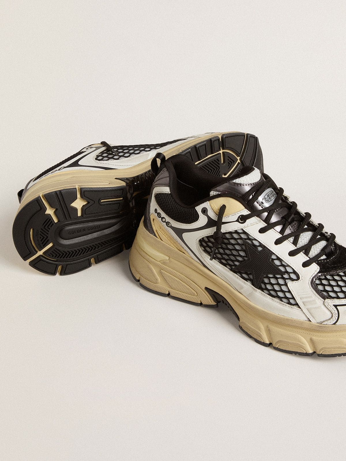 Men’s Lightstar in white leather and black mesh with black TPU star