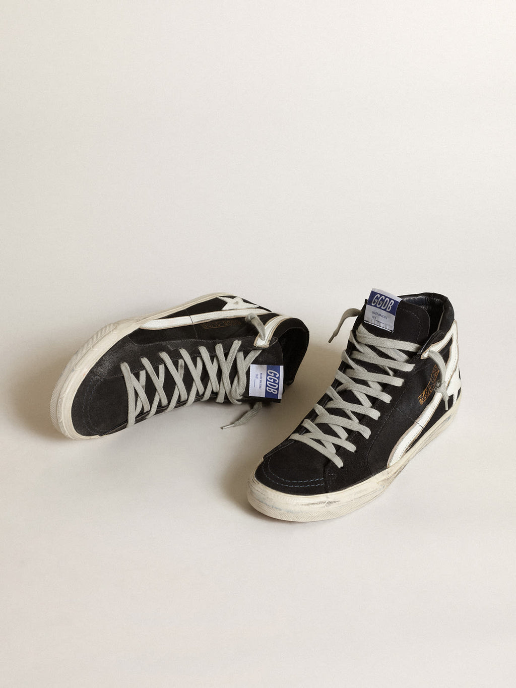 Slide in denim blu navy con stella e virgola in pelle bianca