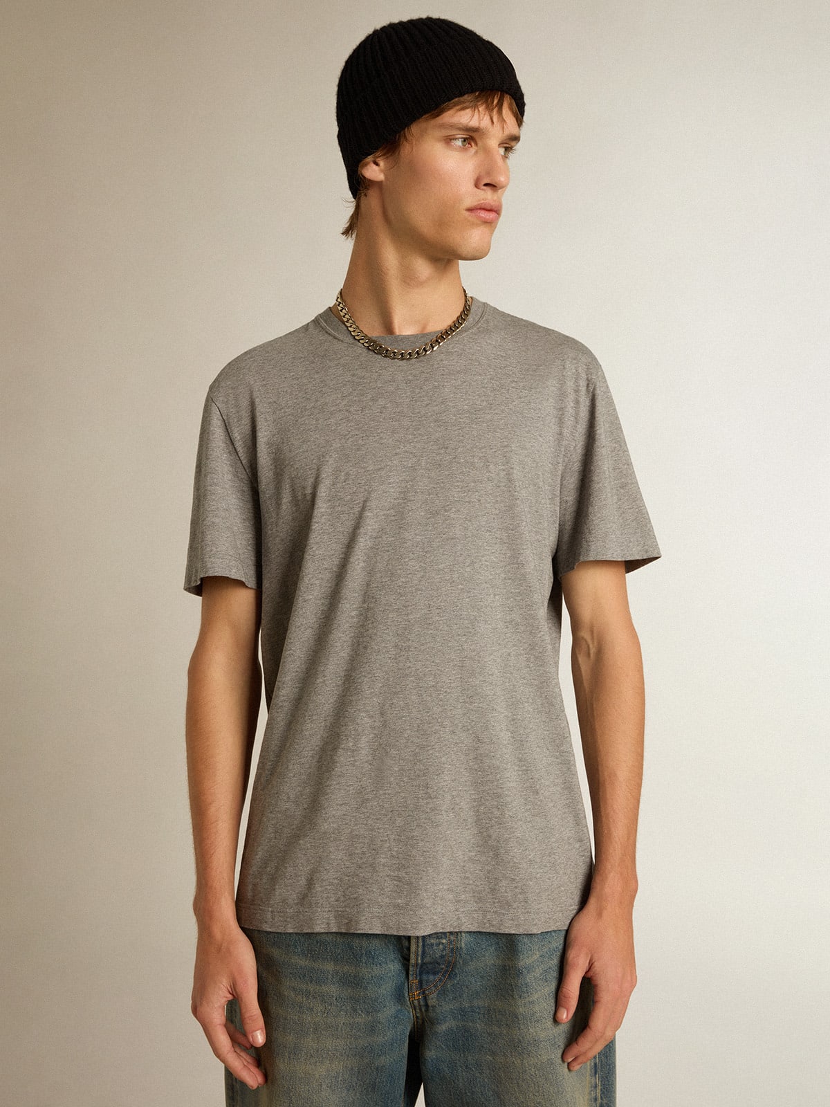 T-shirt in cotone color grigio melange con manifesto sul retro