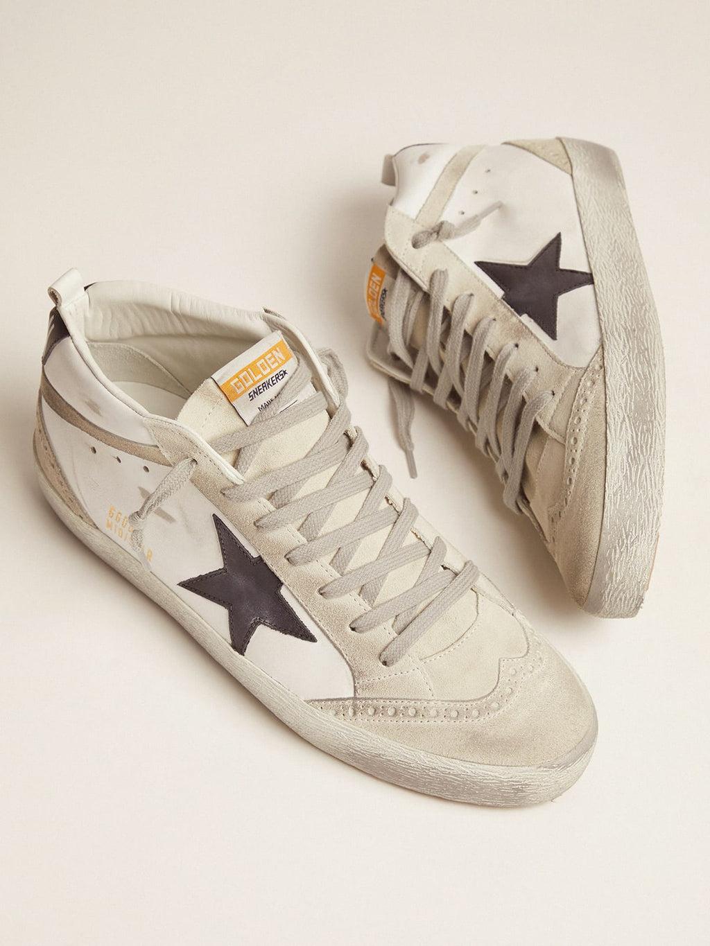 Sneakers Mid Star bianche e nere
